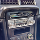 Look at that gorgeous vintage stereo! In addition to adding this tape deck, old docs that came with the car note that the original owner ordered floor mats with his wife’s initials embroidered on them.